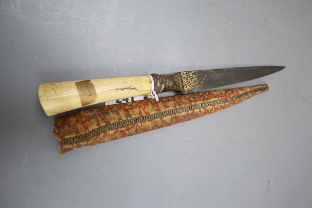 A Persian kard, bolsters and root of blade gold-inlaid with inscriptions, walrus tusk hilt, length blade point to end of handle 34cm